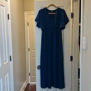 Maxi length v-neck dress in a beautiful dark blue. Never worn size 6